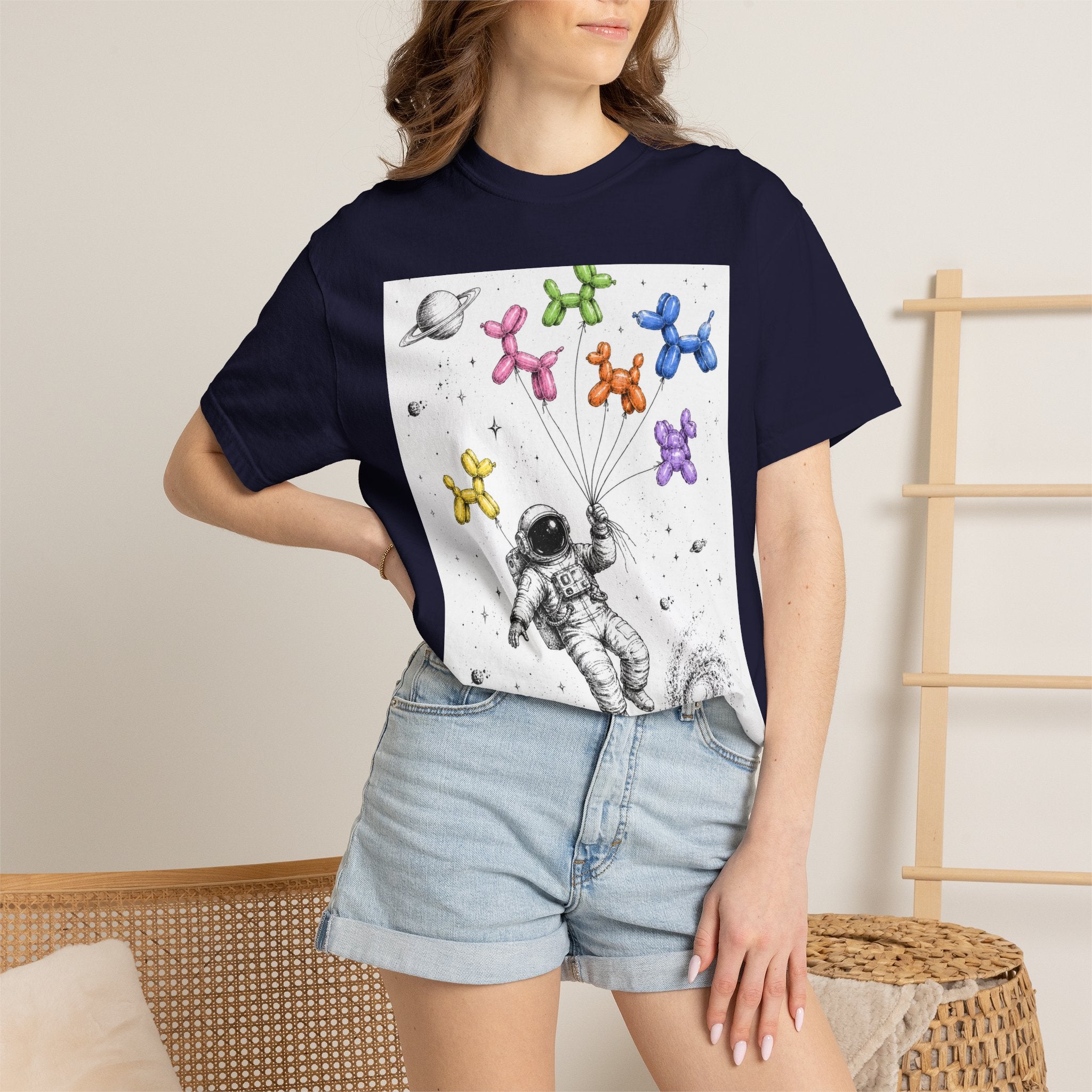 Astronaut Balloon Tee — Space Explorer with Colorful Balloon Dogs