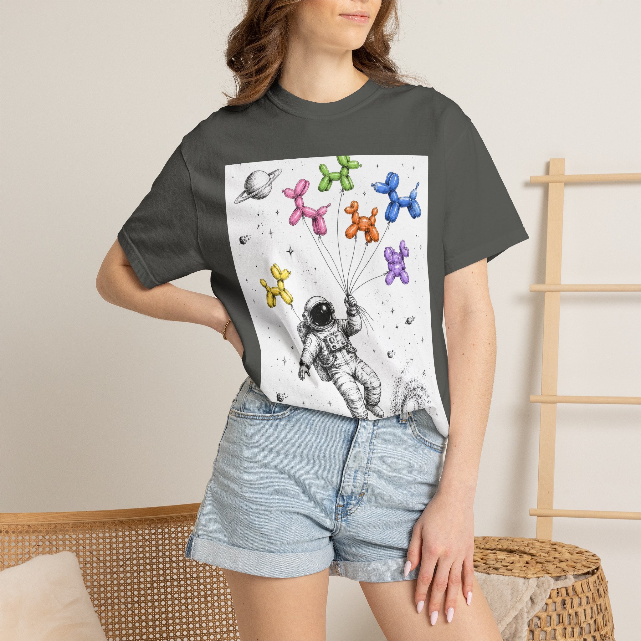 Astronaut Balloon Tee — Space Explorer with Colorful Balloon Dogs